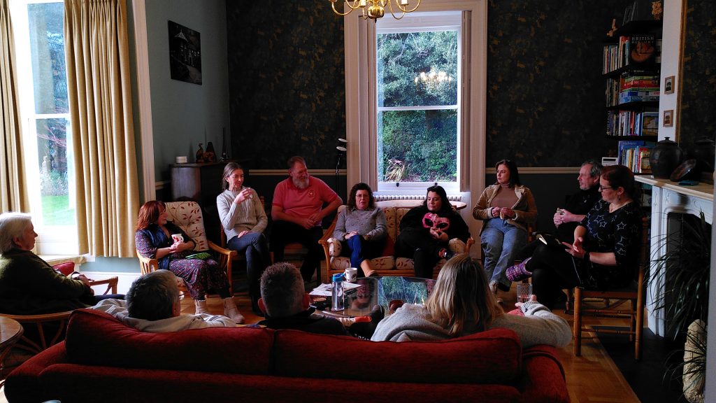 Group of actors in the lounge at The Dell House, Malvern Wells.
